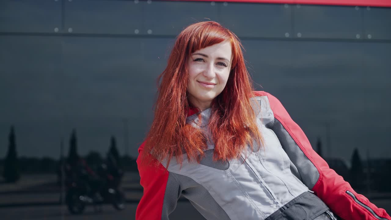 Beautiful girl on motorcycle. Biker girl in leather jacket on motorcycle