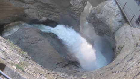 The-Trummelbach-Falls-In-Lauterbrunnen-Valley,-Interlaken,-Bern-Canton,-Switzerland---overhead-slowmo-shot