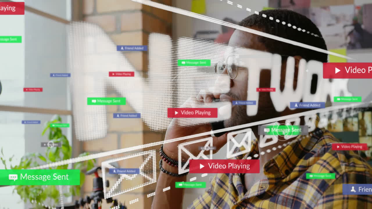 Interacting with animation, man viewing notifications and video icons on screen