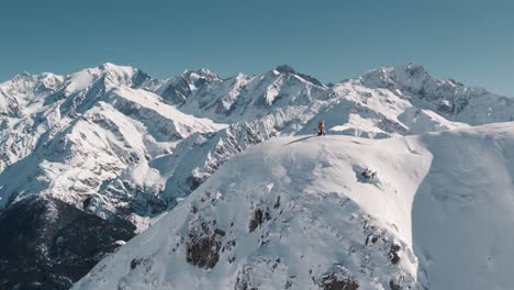 a person skiing in the snowy mountains