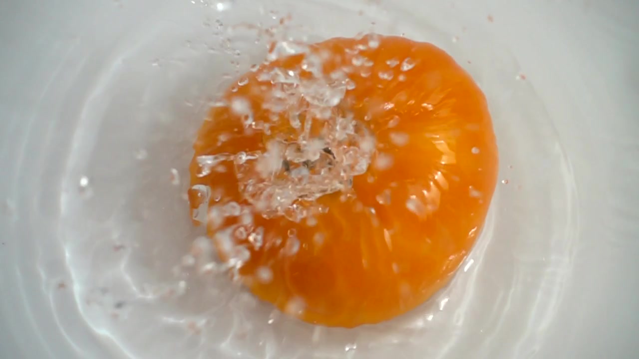 Fresh juicy tomatoes. Slow motion.