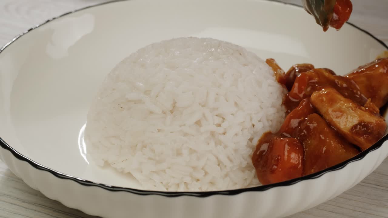 Japanese curry rice with fry pork Tonkatsu, Katsu Kare, Japanese breaded cooking dinner in restaurant, close up macro of asian food