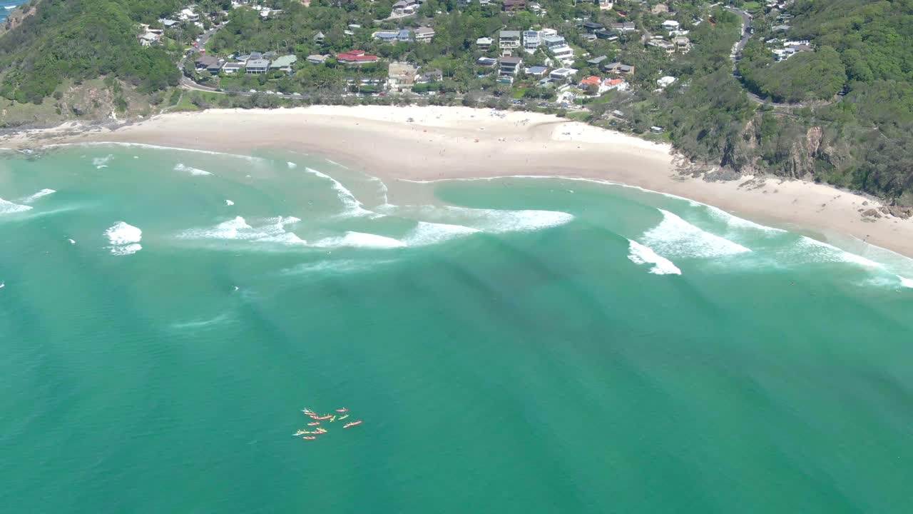 Aerial View of a Beautiful Beach with Kayakers