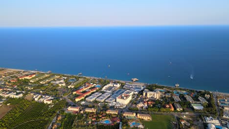 Aerial-4K-drone-footage-of-Kiriş--Kemer-,-and-mountains-–-filmed-in-a-vibrant-summer-time