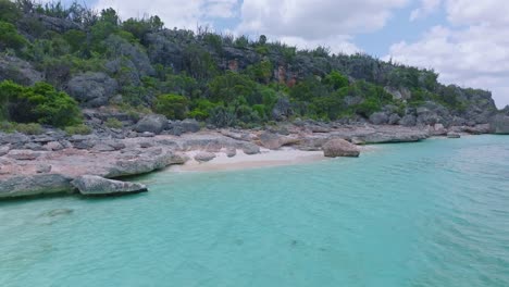 Rocky-beach-with-tropical-white-sand,-remote-paradise-in-national-park-Jaragua