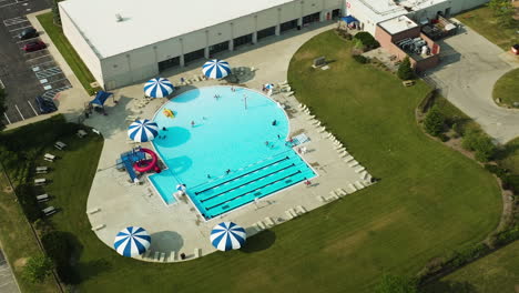 aerial footage of the benjamin harrison ymca public pool in lawrence, indiana