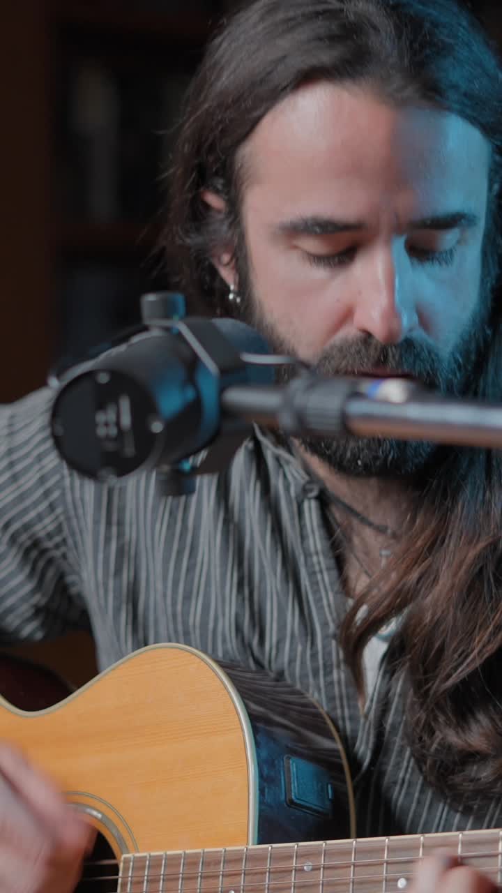 Musician Singing and Playing Acoustic Guitar