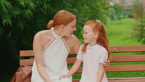 mother and daughter spending time together in the park