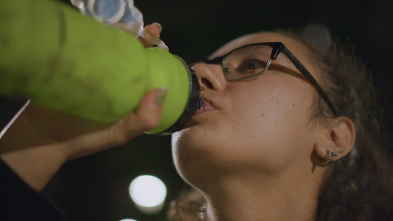Closeup Of Calm Cyclist In Serene Setting, Reflective Latina Cyclist In Peaceful Park With Gentle Lights, Captured Moment Of Tranquil Latina Cyclist Resting In Park With Soft Glowing Lights