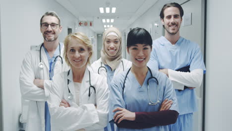 Group-of-young-doctors-standing-in-corridor-4k