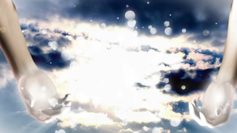 manos brillantes en el cielo