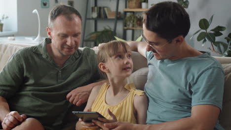 fathers and daughter in living room