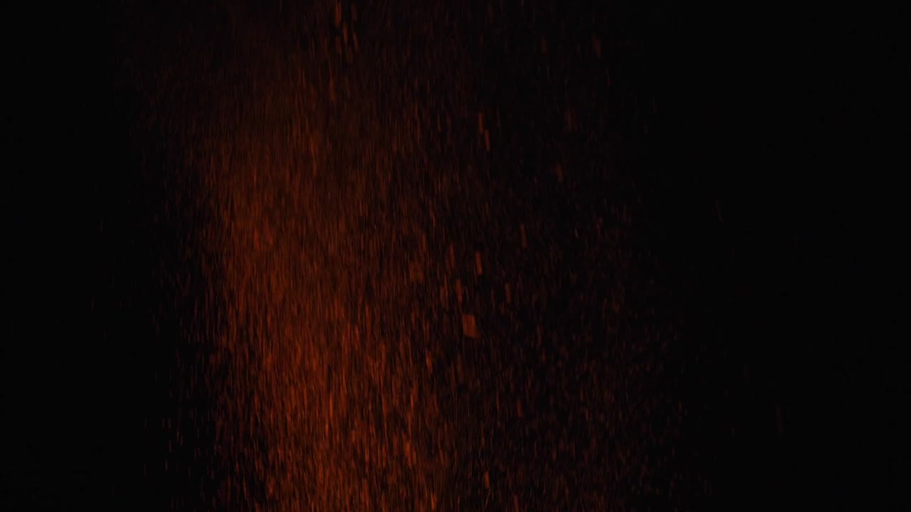 chispas y partículas en la oscuridad