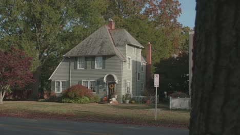 two-story suburban house in the fall