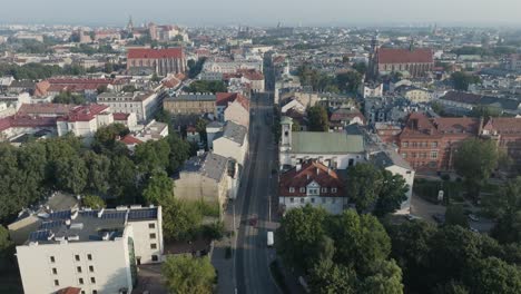 Aerial-Drone-Shot-of-Kazimierz-neighborhood-of-Krakow-Poland-with-the-river-Vistula-at-Sunrise