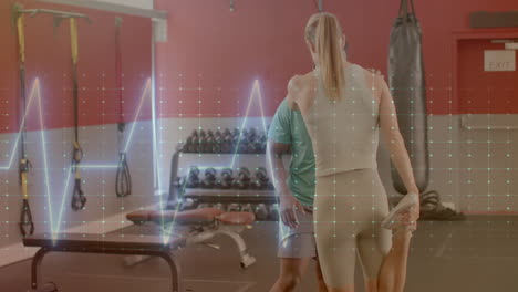 animation of data processing over diverse man and woman exercising in gym