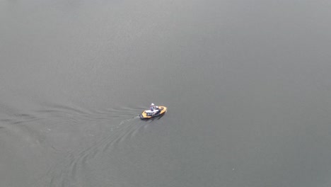 Floating-Personal-Watercraft-With-Tourist-On-Peaceful-Water-Of-The-Ocean