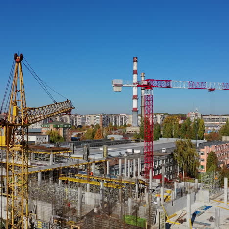construction site with a bird's eye in a megacity. video shooting with drone. new office in a new residential complex. aerial view.