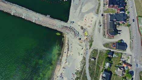 aerial view of the astonishing fishing village of byxelkrok in öland, sweden during summer - drone shot