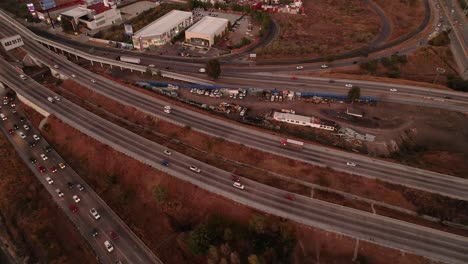 aerial view of highway interchange at sunset