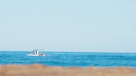 small fishing boat over the mediterranean sea