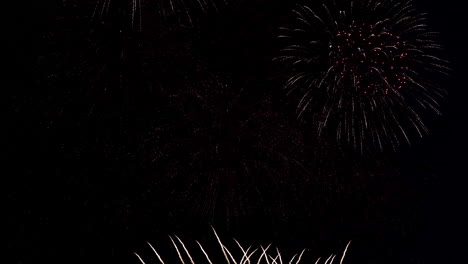 colorful firework display at night on sky background