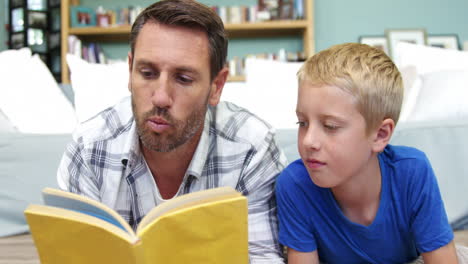 father reading a story to his son