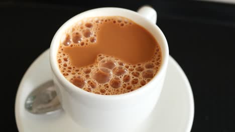 close up of cup of milk tea on table ,