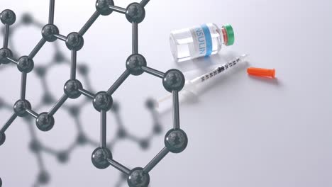 molecular structure model over syringe and vaccine vial on white background