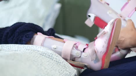 child with leg brace