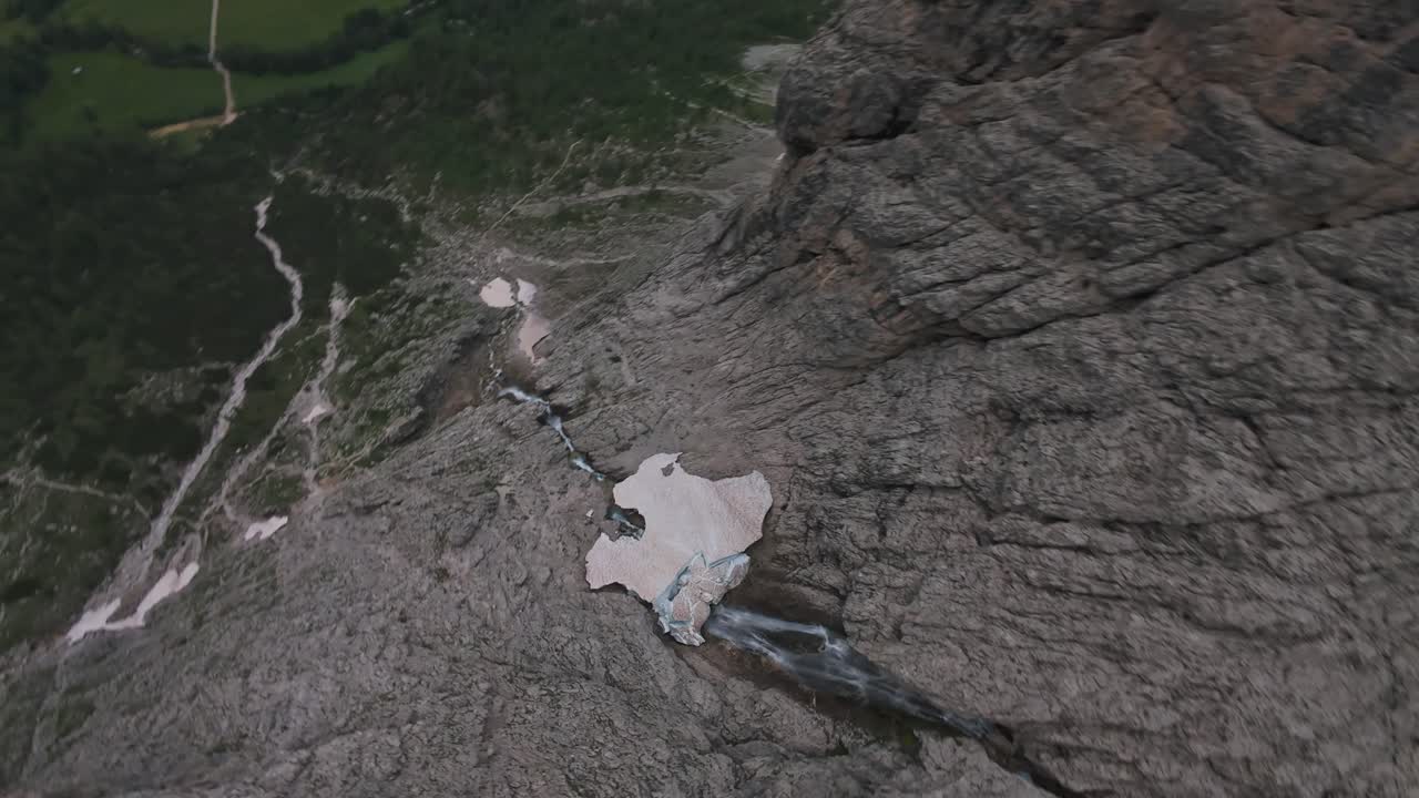 Aerial View of a Waterfall in the Mountains