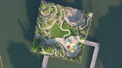 a top down shot directly above this little island in nyc on a sunny morning