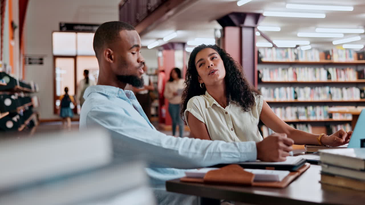 Students collaborating in a library