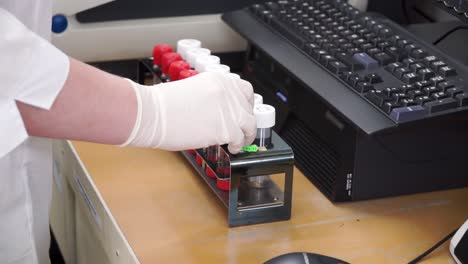 medical lab technician performing blood tests