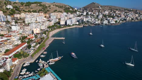 Exploring Saranda Bay: Pier Promenade, Thriving Tourist Scene, Beautiful Beachfront Hotels - Your Ideal Summer Vacation Destination Awaits