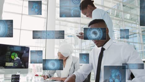 animation of round scanners and data processing against diverse businesspeople working at office