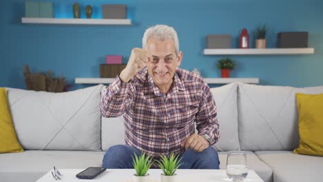 Man-experiencing-joy-looking-at-camera.