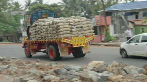 indian truck driving on the road