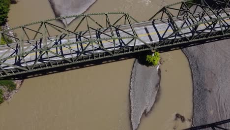 Drone-flying-above-bridges-on-the-Nooksack-River,-Washington-State