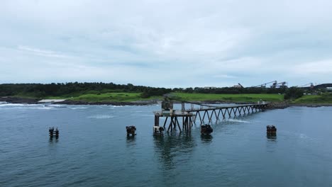 Old-historic-industrial-structure-protruding-from-an-environmentally-fragile-part-of-coastline