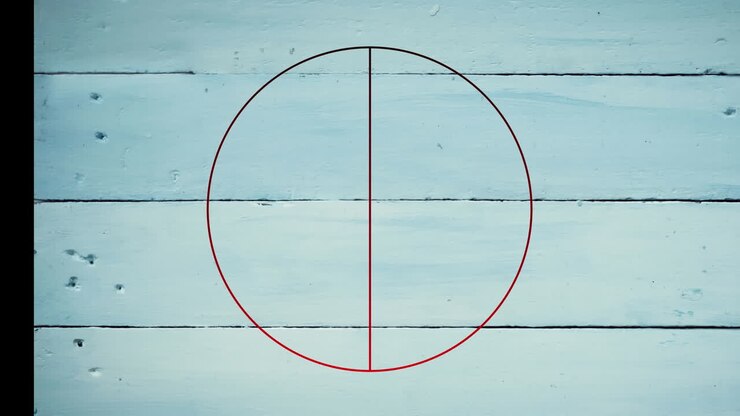 Animation of red line in circle over white wooden table