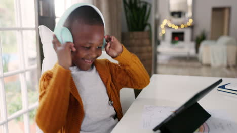 headphones, music and child dancing with a tablet