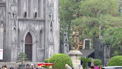 people walking near st. joseph cathedral, hanoi