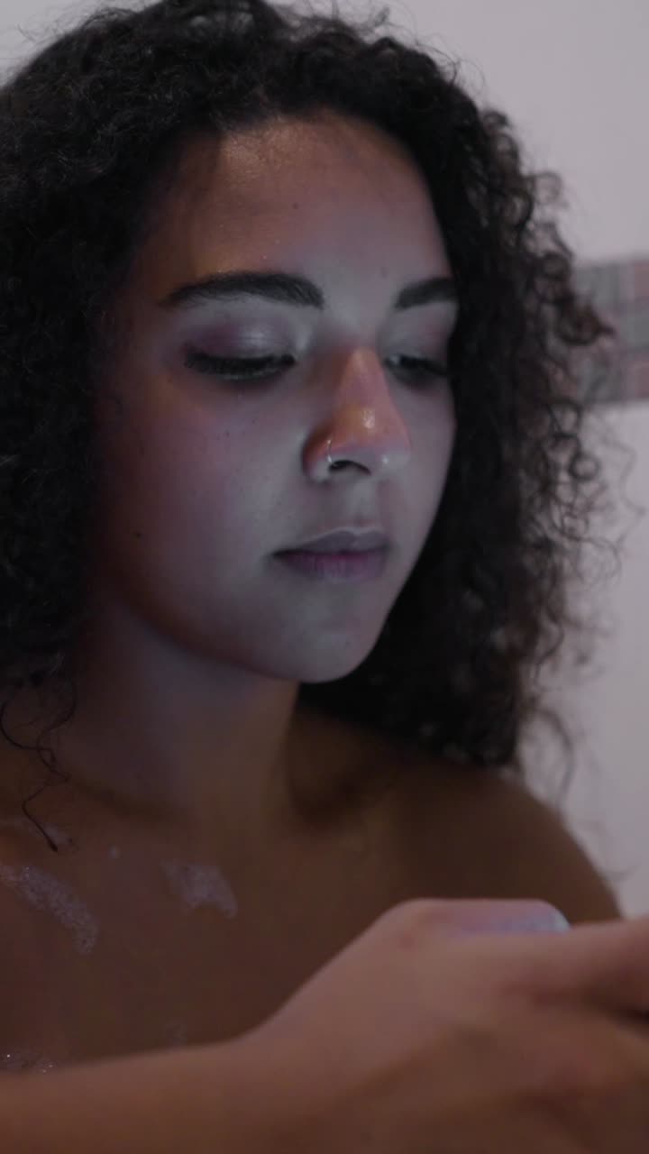 Portrait of a Woman with Curly Hair and Nose Ring