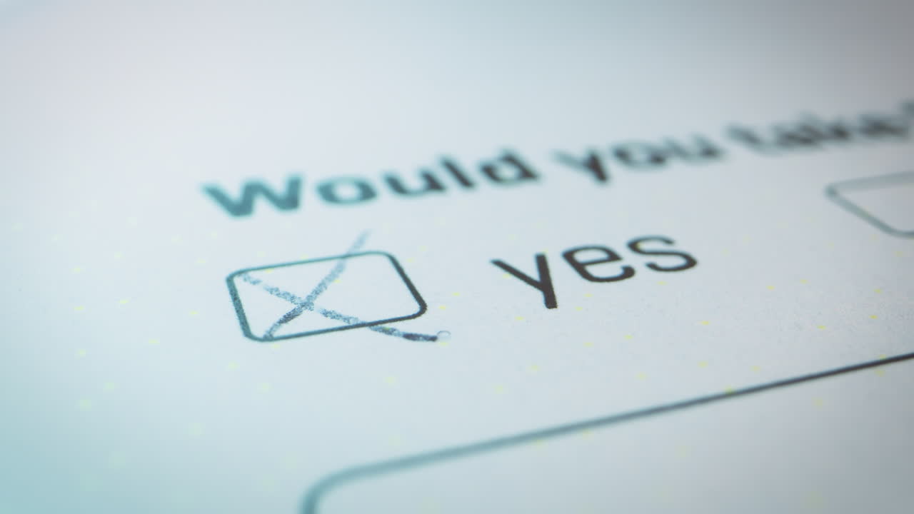 Pen hovers over the selection rectangle of YES or NO checkbox, unsure choice official document, close-up