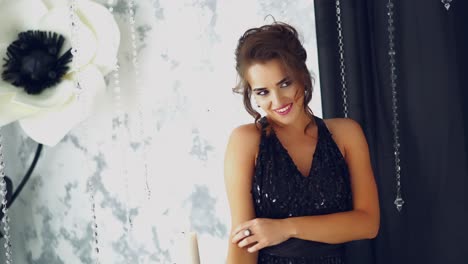 lady wearing evening dress. elegant lady wearing evening dress posing in luxury interior