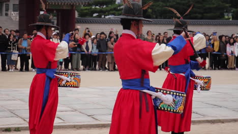 royal guards performing a ceremony at a korean palace
