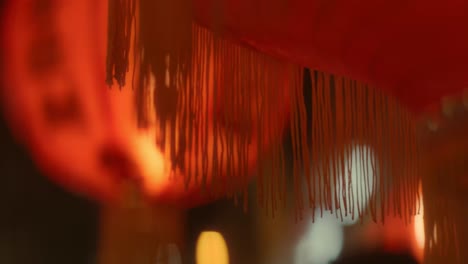 detail decoration of traditional chinese lanterns illuminated at night