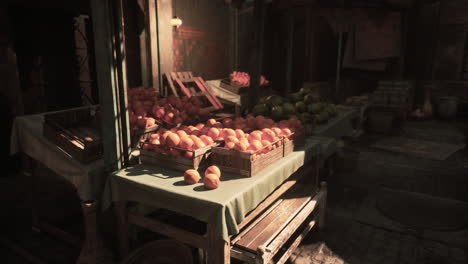 a fruit market stall in an old town with oranges for sale