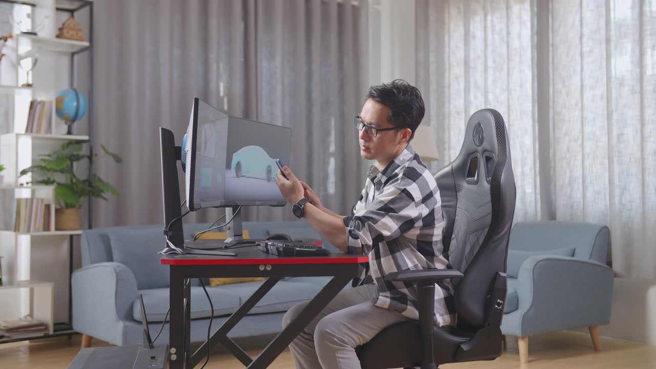 집에서 3d 자동차 디자인을 하는 남자